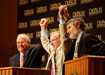 Karl Rove, Howard Dean, and Bruce Stinebrickner holding hands in victory